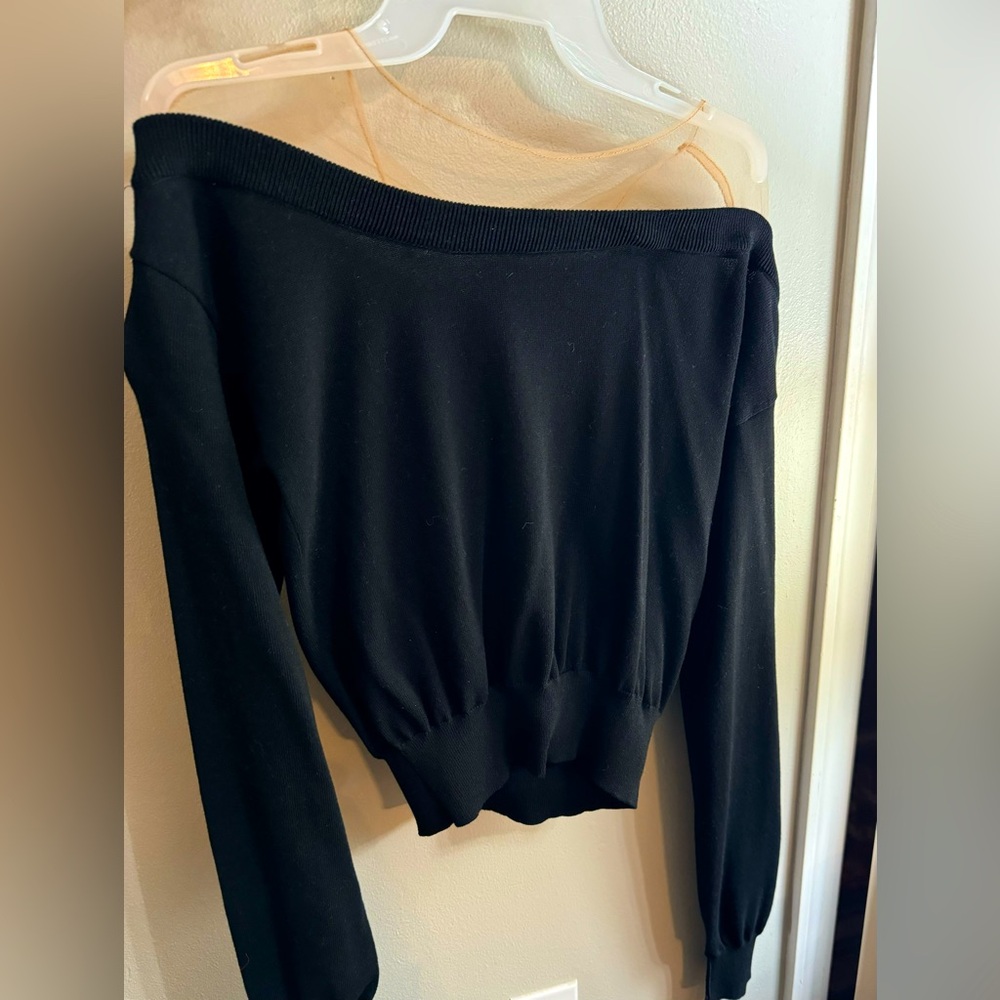 Endless rose black sweater with cream colored mesh top area.